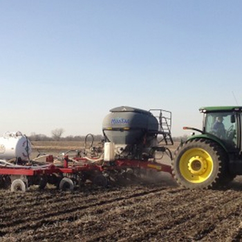 Custom application of Anhydrous Ammonia and dry fertilizer in the same pass.